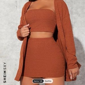Orange 2 piece skirt set with cardigan.
